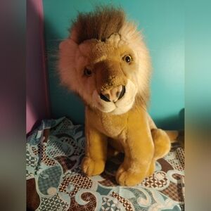 A&A sitting lion stuffed animal
